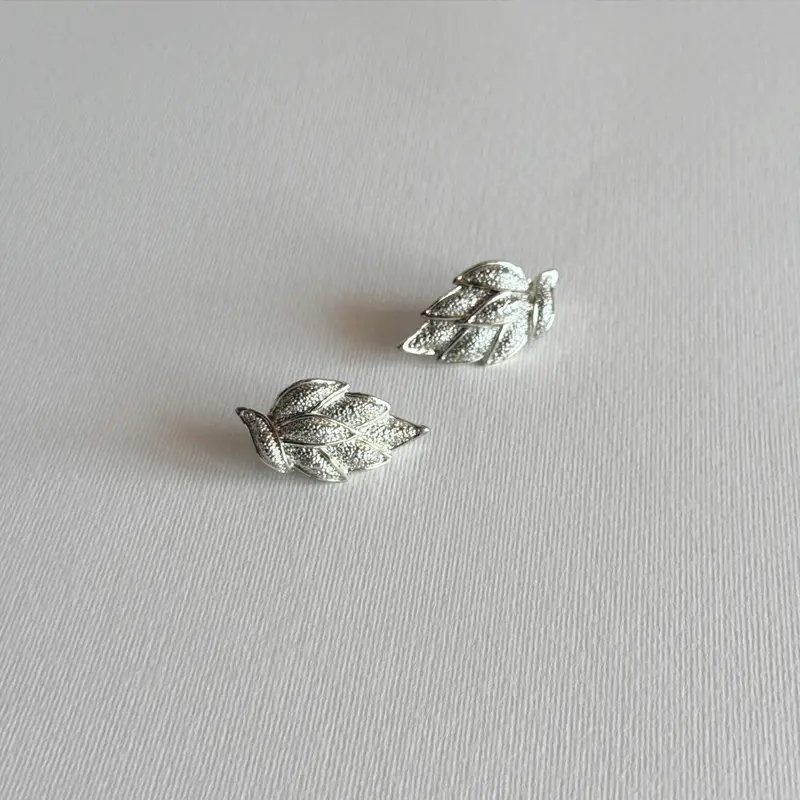 Coro Leaf Clip Earrings