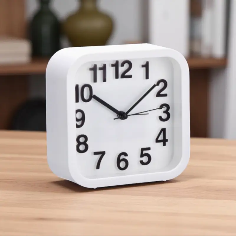Orologio sveglia in plastica – 2 colori assortiti