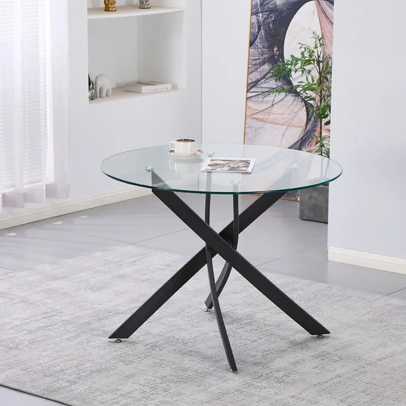 Tavolo da pranzo tondo fisso Peyton con piano in vetro temperato e gambe nere 100x100 cm.